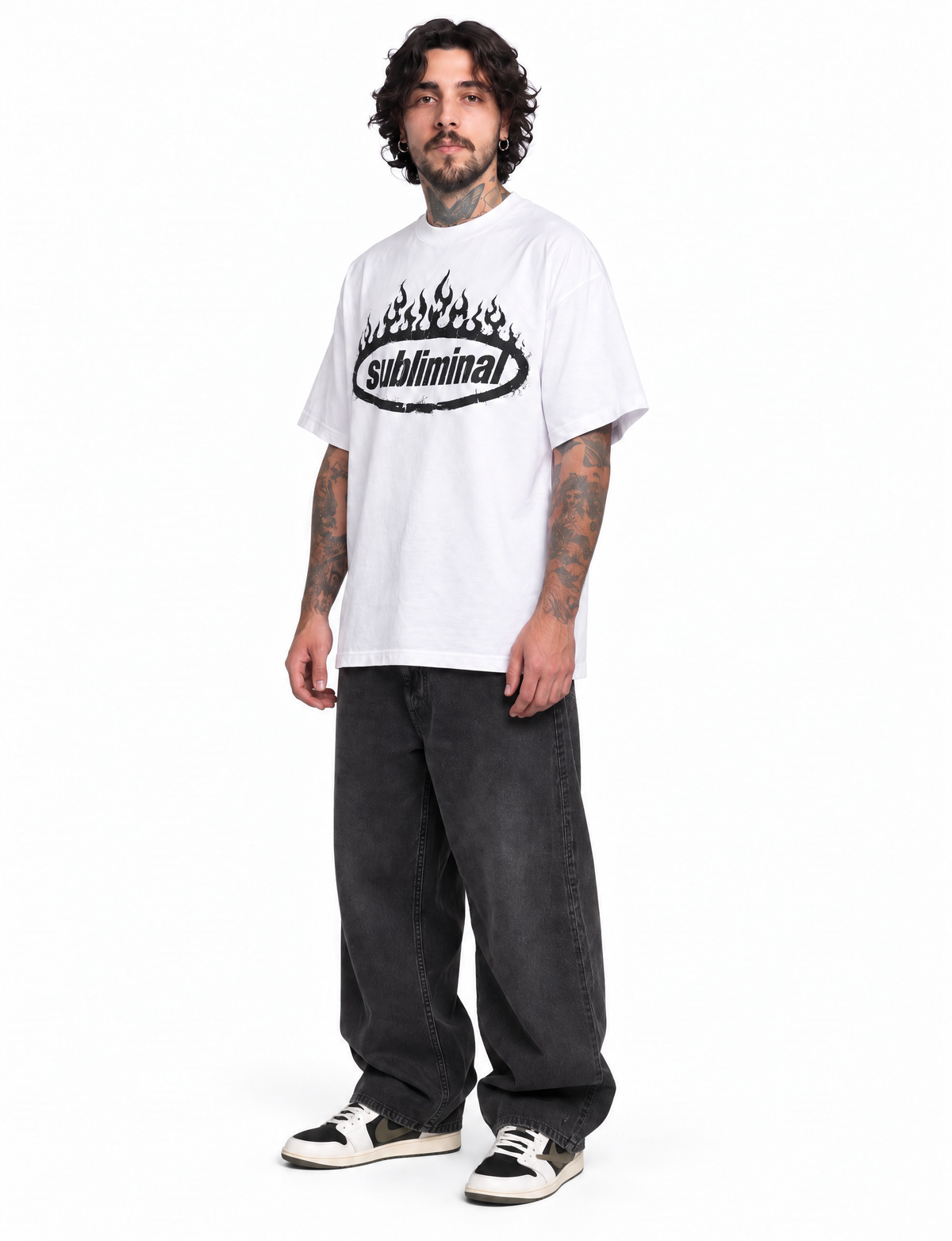 White — SUBLIMINAL Tee, three-quarter view on model showing the chest graphic and relaxed fit