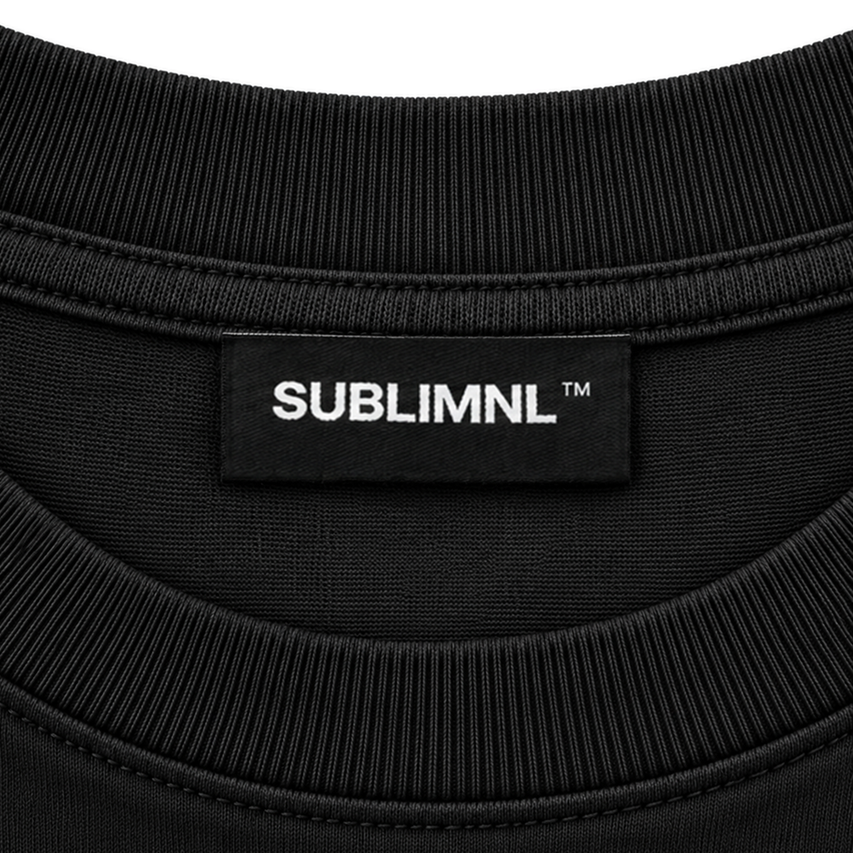 Black — SUBLIMINAL Tee, neck tag detail